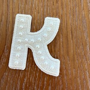 Pearl K letter patch